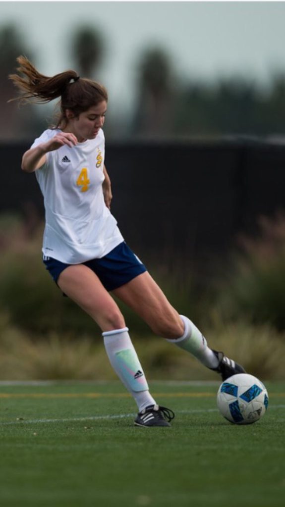 Strong female soccer player